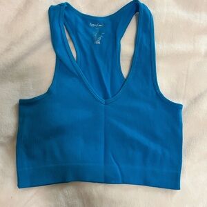 Blue croptop, never worn, no tags, size M/L
